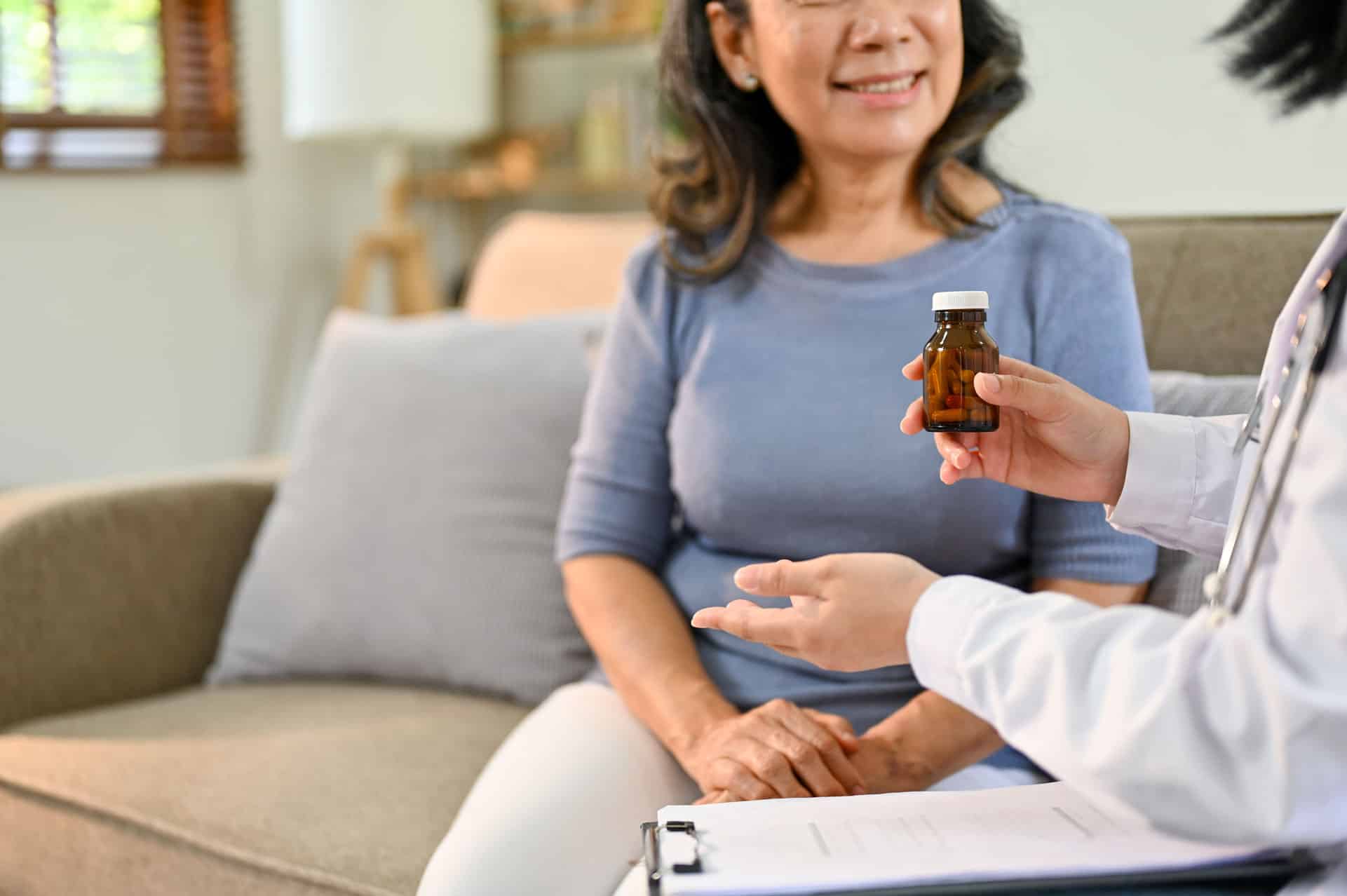 provider-explaining-use-new-medicine-female-patient